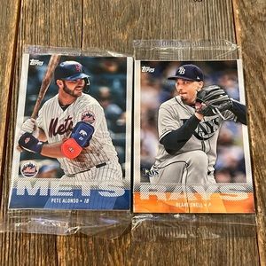 Sealed packs of Topps baseball cards with Mets Pete Alonso and Rays Blake Snell.